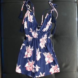Lulu’s WE FOUND LOVE BLUE FLORAL PRINT ROMPER